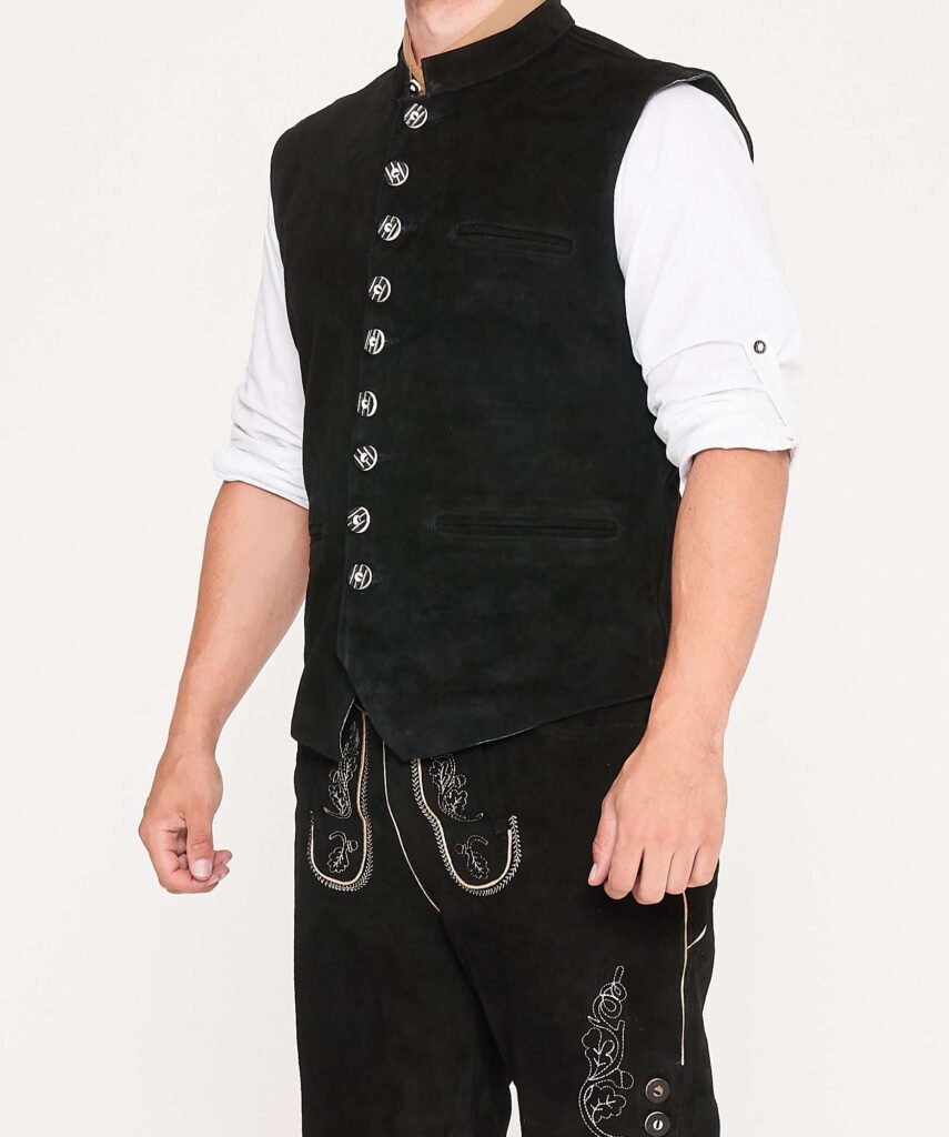 Oktoberfest Style Guide: Rocking Lederhosen for Men and Embracing Traditional German Clothing 5 Man in black waistcoat and black embroidered Lederhosen. - Lederhosen For Sale