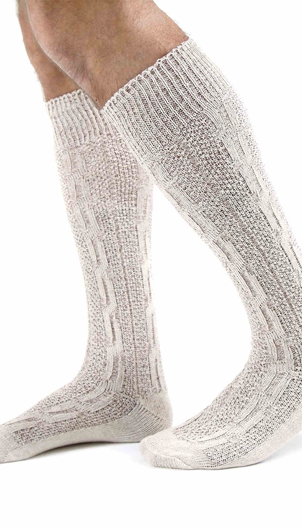 Close-up of off-white knee-high cable knit Bavarian socks. - Lederhosen For Sale