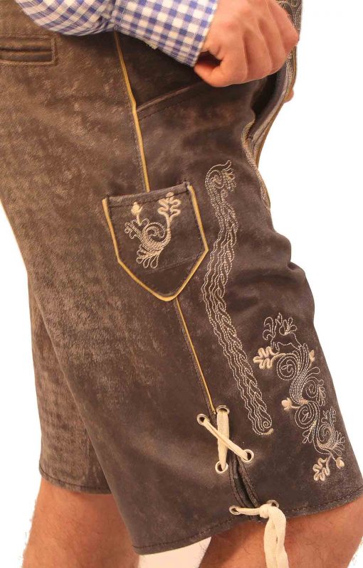 Close-up side view of brown Lederhosen shorts with embroidery. - Lederhosen For Sale