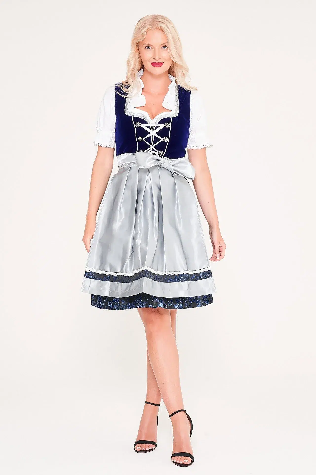 Blonde woman posing in royal blue Dirndl with apron. - Lederhosen For Sale