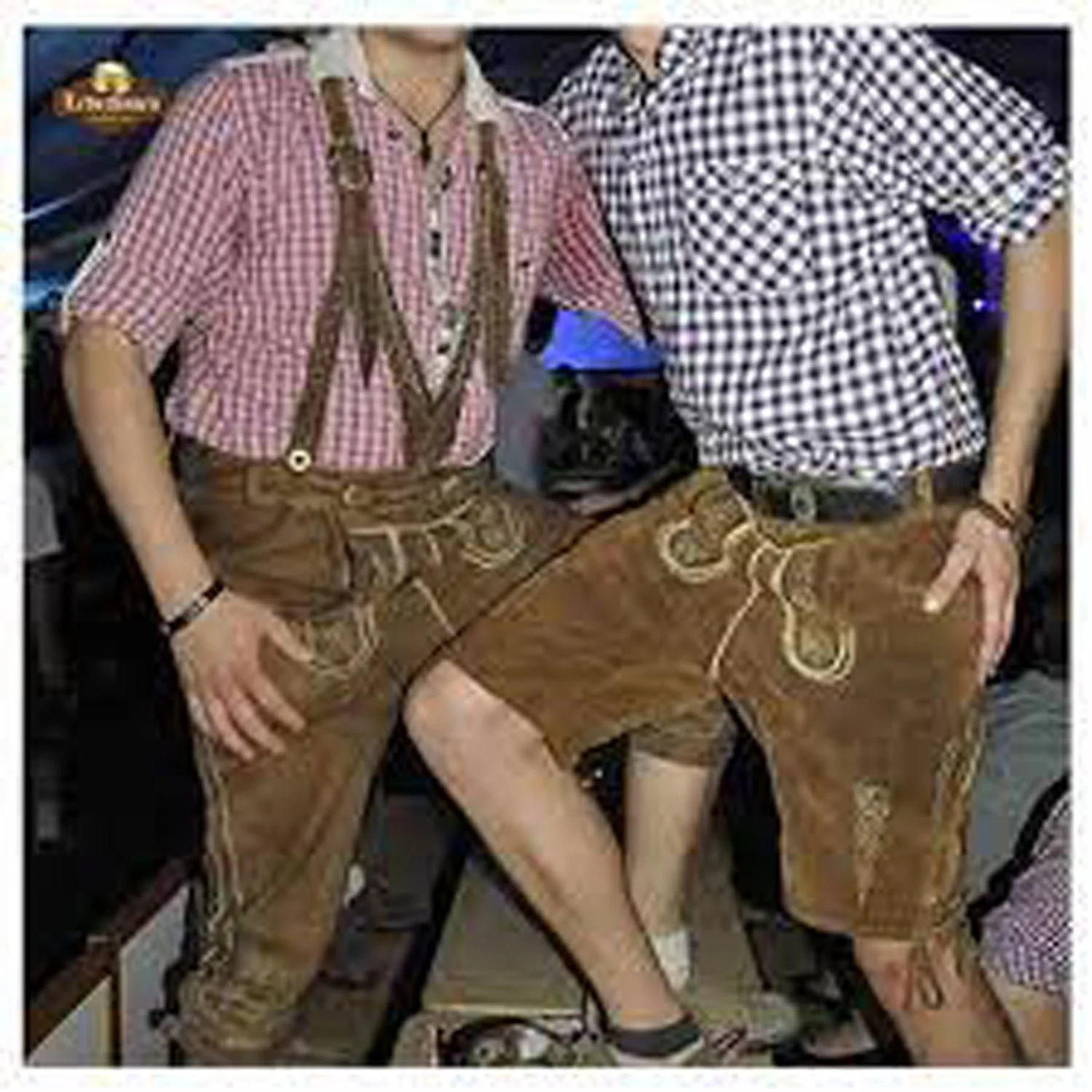 Two men wearing traditional brown embroidered Lederhosen with checkered shirts at an Oktoberfest event. - Lederhosen For Sale