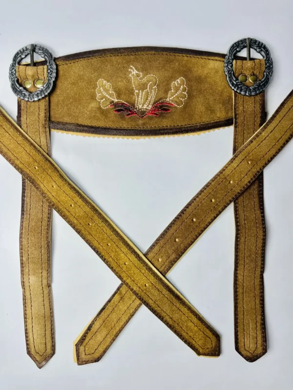 Full view of vintage brown handcrafted Lederhosen suede suspenders with white stag embroidery and ornate round silver buckles. - Lederhosen For Sale